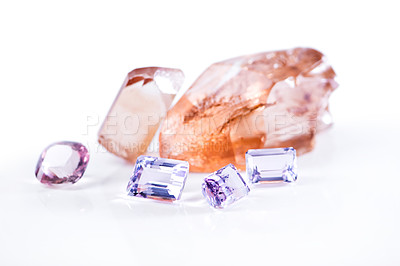 Buy stock photo Rock, amethyst and pink diamond in studio with isolated white background for natural resource, jewel and sparkle for luxury. Gemstone, crystal and reflection in closeup for shine, glow and mineral