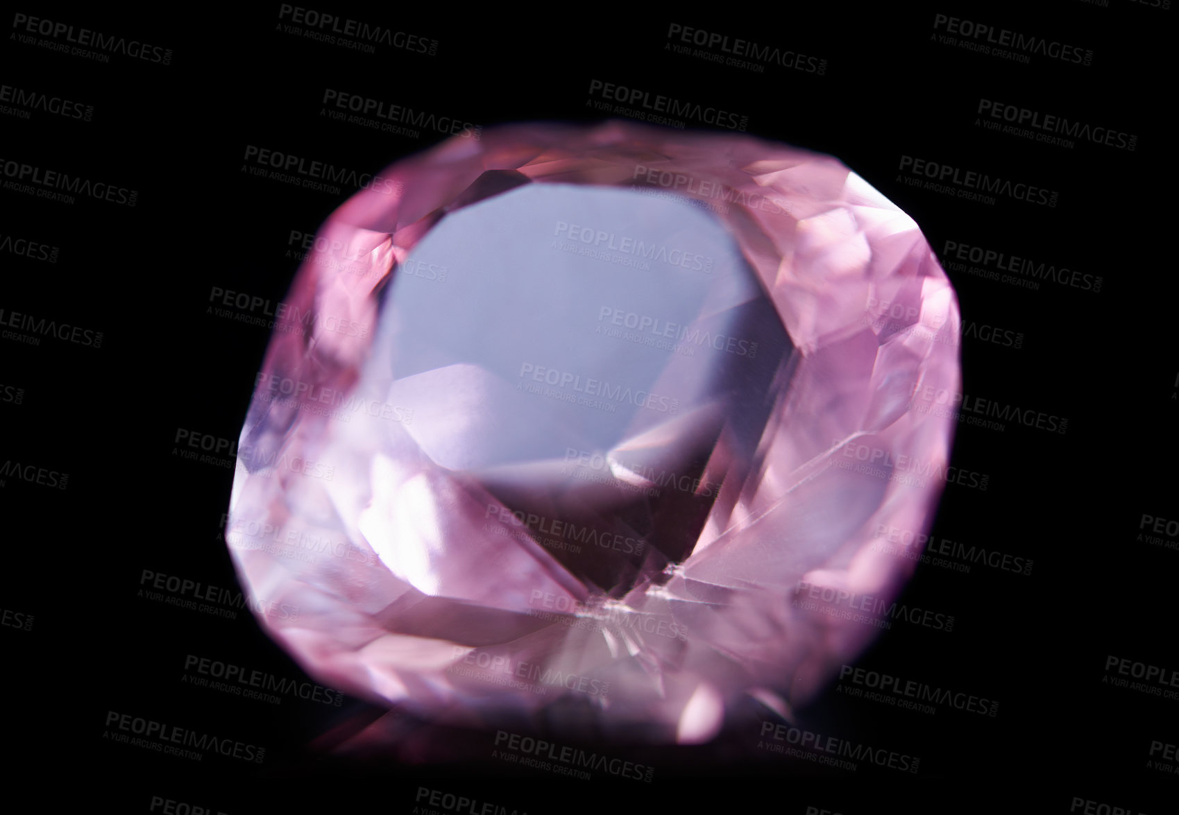 Buy stock photo Pink diamond, jewel and stone by black background for natural resource, sparkle and luxury. Rocks, mineral and crystal in closeup for gem with shine, glow and brilliant cut with reflection in studio