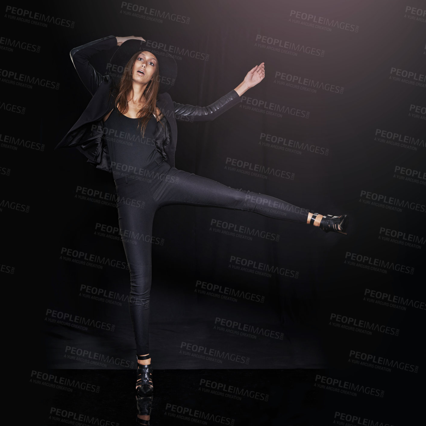 Buy stock photo Portrait, fashion and balance with woman on black background in studio for clothing dance. Leather, model and outfit with confident young person in dark clothes for chic, edgy or trendy style