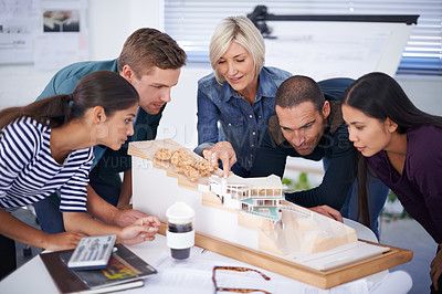 Buy stock photo Architect, teamwork and diversity with design model, building and project with colleague people. Office, planning and working together in meeting for construction, pointing and concept for home build