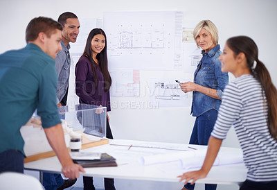 Buy stock photo Architecture, blueprint and planning with developer team in office together for meeting or teamwork. Building, collaboration or construction model with man and woman architect group in workplace