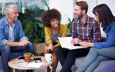 Buy stock photo Shot of a group of happy coworkers in a meeting
