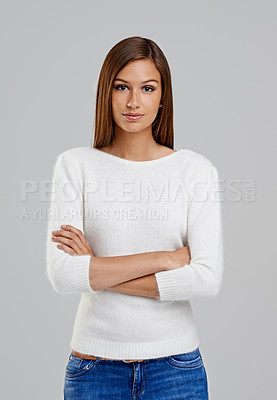 Buy stock photo Portrait, arms crossed and woman in studio for fashion isolated on a white background. Confidence, young person and serious model in casual clothes, jeans or trendy style on backdrop in Argentina