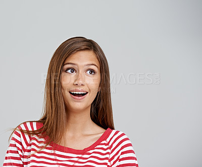 Buy stock photo Face, woman and excited for fashion in studio on grey background with casual, street wear and wow in confidence. Happy, female person and smile or satisfied with trendy outfit and smart clothes.