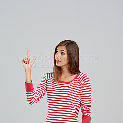 Buy stock photo Fashion, mockup and finger of woman pointing for promotion, clothes and trendy with outfit isolated in studio background. Female person, model and lady with marketing, advertising and copy space