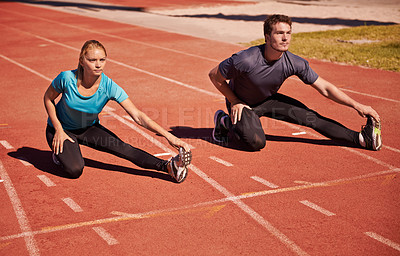 Buy stock photo Training, legs and couple stretching in stadium for race, marathon or competition for health. Sports, fitness and runner athletes with warm up exercise for running cardio workout on outdoor track.