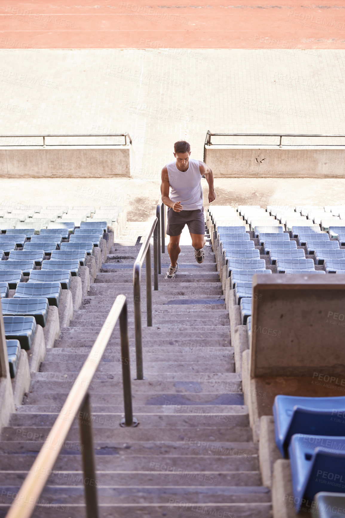 Buy stock photo Stairs, running and man with training, exercise and cardio with wellness and healthy with sunshine. Person, runner and athlete with steps and summer with hobby and fitness with practice with energy