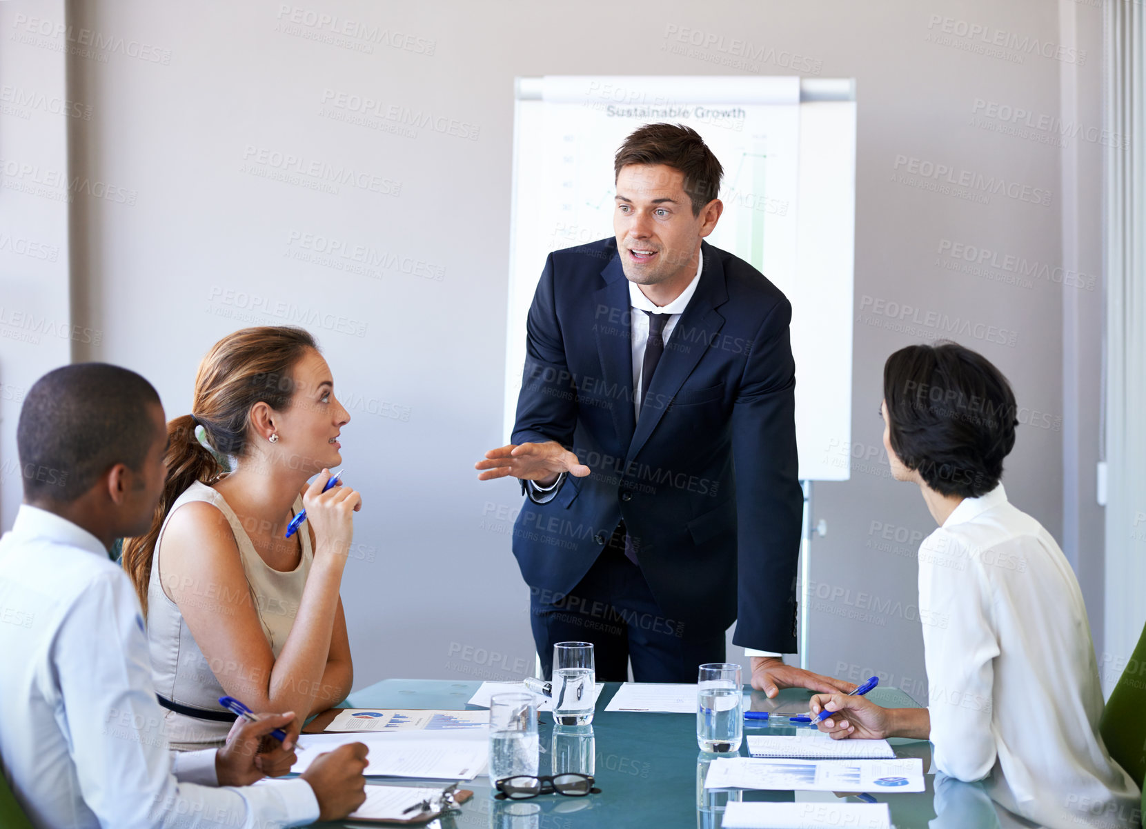Buy stock photo Meeting, presentation and businessman in office with discussion, stats or speaker at b2b workshop. Teamwork, management and business people in conference room brainstorming ideas, planning and review