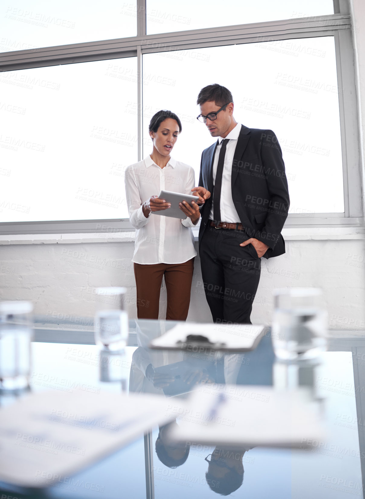 Buy stock photo Business people, tablet and partnership on plan in discussion, office and collaboration on idea. Colleagues, teamwork and internet for online research, web and communication in workplace for support