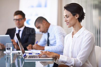 Buy stock photo Woman, boardroom and smile with typing on laptop to brainstorm for presentation, paperwork and teamwork. Business people, office and personal assistant in table with strategy for company growth.