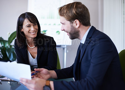 Buy stock photo Business people, teamwork and happy in meeting with documents for financial review, data analytics and discussion. Collaboration, man and woman in boardroom with infographic feedback and strategy