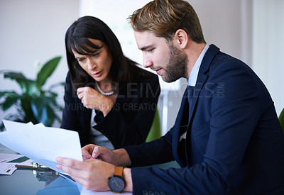 Buy stock photo Business people, teamwork and planning in meeting with documents for financial review, brainstorming and discussion. Collaboration, man and woman in boardroom with project feedback and sales strategy