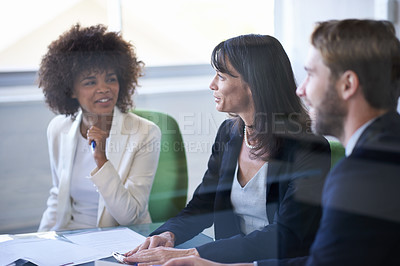 Buy stock photo Business people, teamwork and planning with discussion in meeting for corporate strategy, documents and diversity. Professional, employees and collaboration in boardroom with partnership or listening