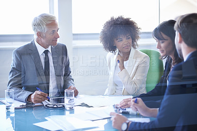 Buy stock photo Business people, teamwork and documents at meeting in conference room for corporate planning, networking and diversity. Professional, employees and collaboration in office with lens flare or feedback