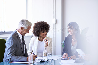 Buy stock photo Corporate, employees and discussion in conference room for strategy or collaboration for planning, partnership and conversation. Boardroom, business people and reports for b2b meeting for company.