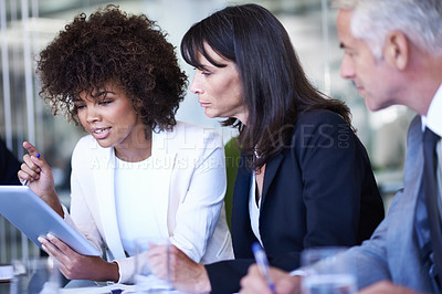 Buy stock photo Team, tablet and business people in meeting, planning and brainstorming strategy in office. Collaboration, technology or diverse professional group, CEO and consultants in conversation for discussion