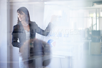 Buy stock photo A view of a businesswoman giving a presentation