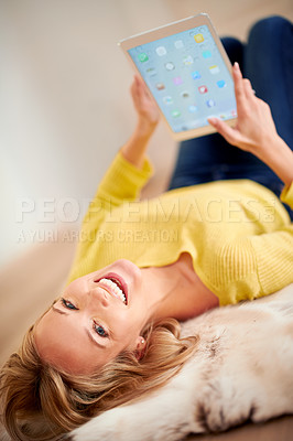 Buy stock photo Portrait, tablet and smile with woman on floor of home for browsing, communication or weekend free time. Technology, social media and relax with happy young person in living room of apartment