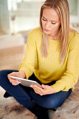 Buy stock photo Tablet, search and woman relax on a floor with social media, streaming or subscription in her home. Digital, ebook and female person in a living room with google it, sign up or Netflix and chill app