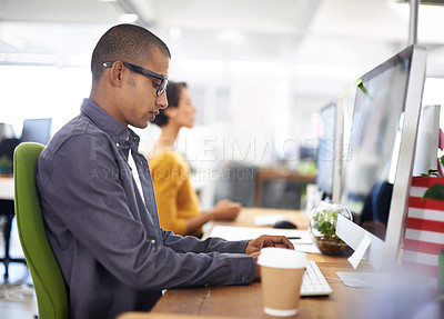 Buy stock photo A young designer working in the office