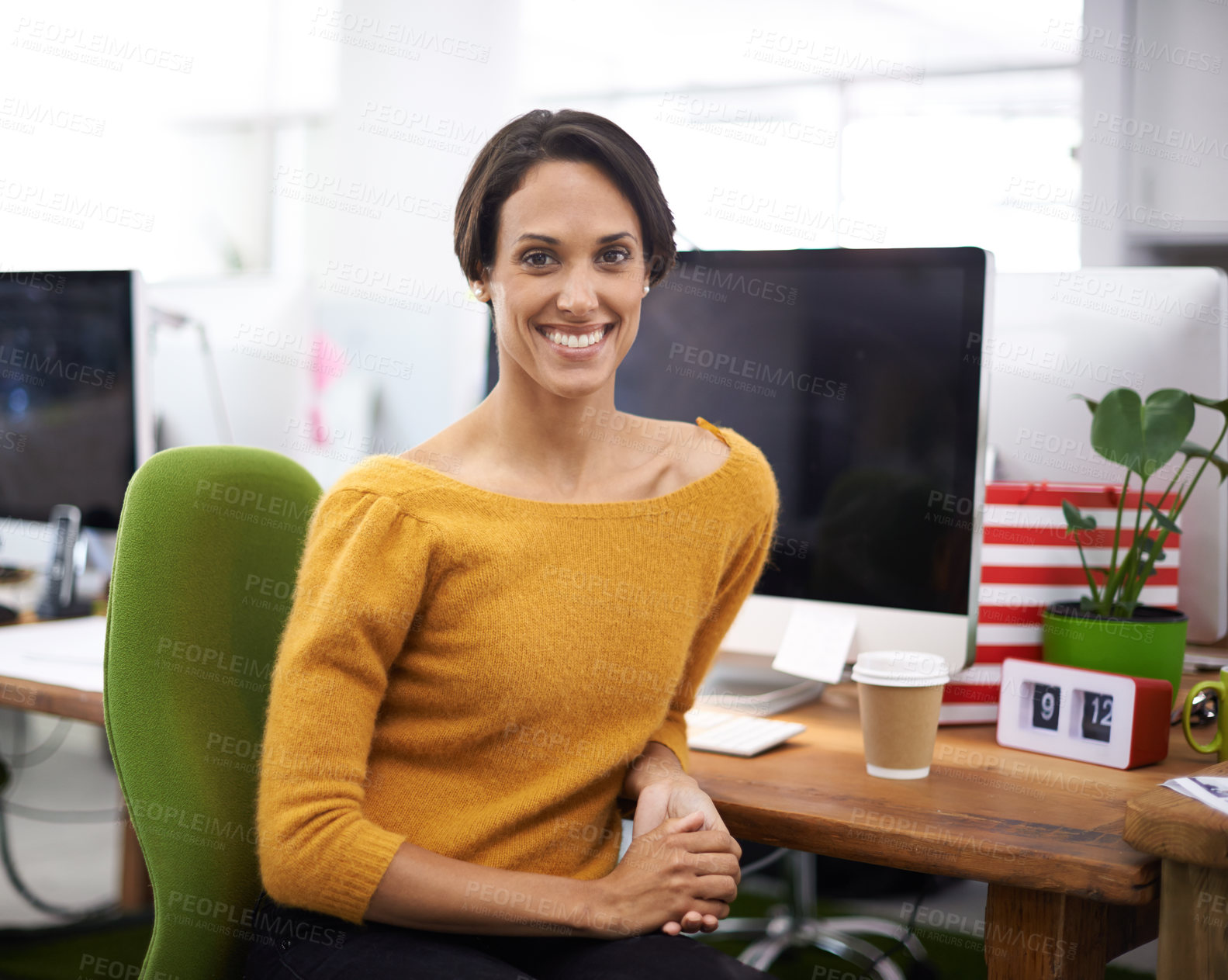 Buy stock photo Portrait, happy and business woman in office, startup or company for creative job at desk in workplace. Face, smile and professional entrepreneur, employee and designer working on career in Brazil