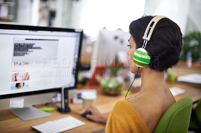 Buy stock photo Business, designer and woman with headphones at computer screen in office for creative internship and web design. Employee, rear view and monitor for multimedia production and video animation at desk