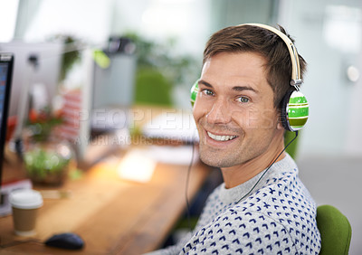 Buy stock photo Portrait, office and headphone for happy male worker, computer and podcast for entertainment. Technology, employee and radio streaming at workspace in Holland, startup or entrepreneur for company