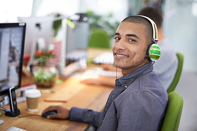 Buy stock photo Business, designer and portrait of man with headphones in office on computer for creative internship and web design. Employee, face and happiness for multimedia production, website or video at desk