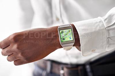 Buy stock photo Cropped view of a man wearing a smartwatch - All screen content is designed by us and not copyrighted by others