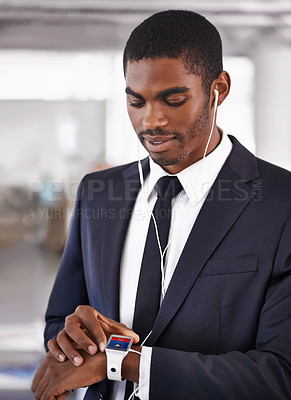 Buy stock photo Office, earphones or businessman with smart watch for time technology or device for schedule. Black man, formal outfit or screen display network gadget for radio or music app, podcast or notification