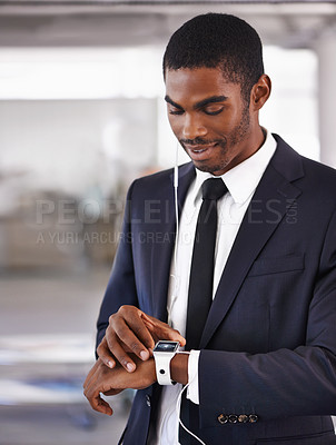 Buy stock photo Check, earphones or businessman with smart watch for time technology or device for schedule. Travel, formal outfit or black man with network gadget for radio or music app, podcast or notification