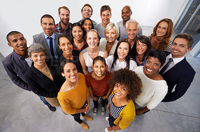Buy stock photo High angle shot of a diverse group of business professionals