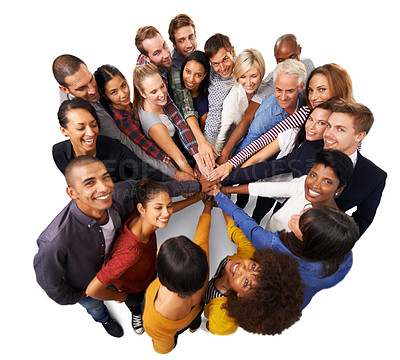 Buy stock photo Shot of a diverse group of business people joining their hands in a symbol of unity