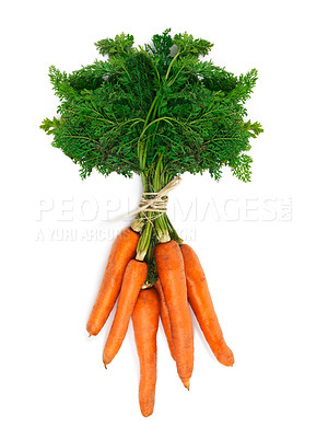 Buy stock photo High angle shot of a bunch of carrots against a white background