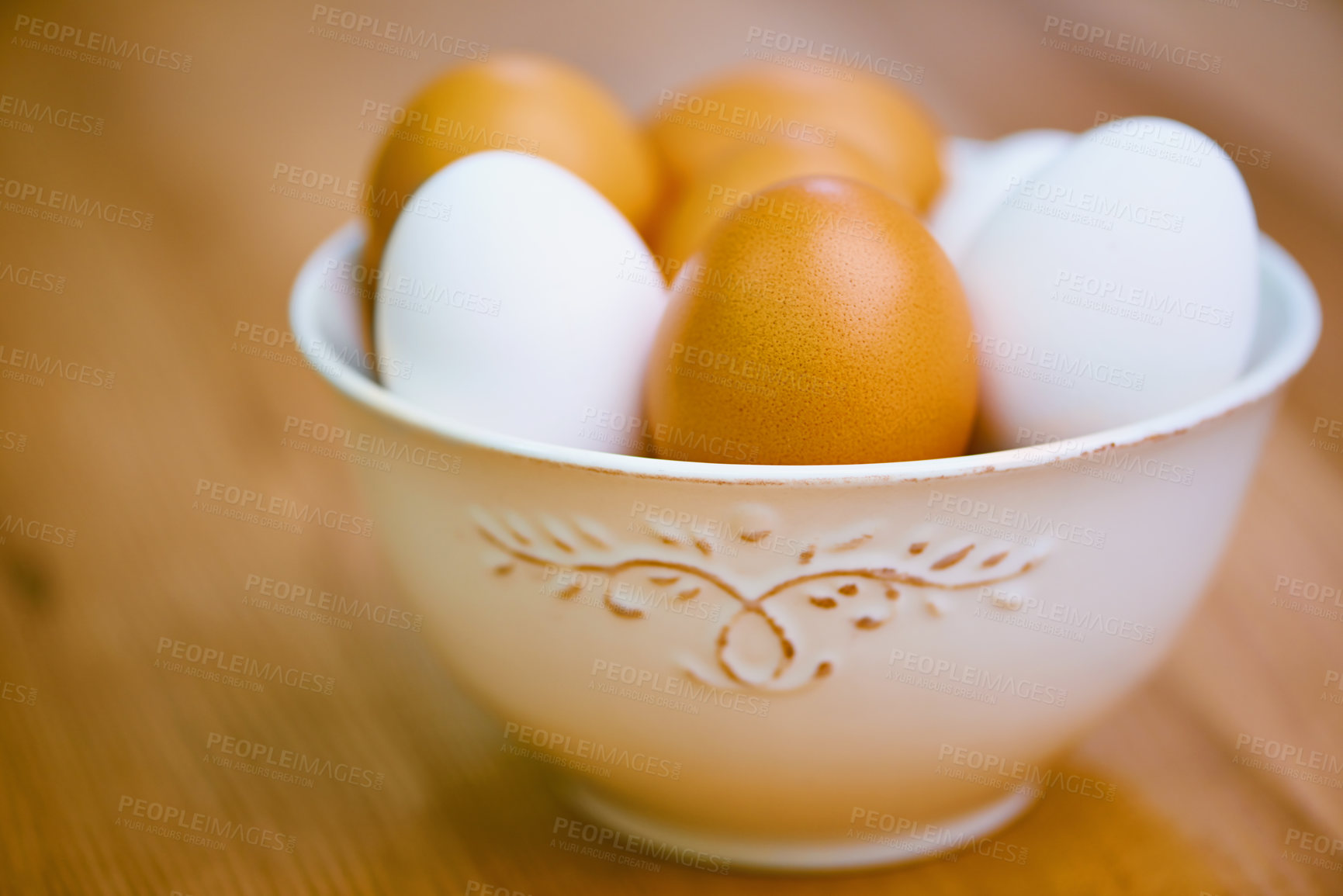 Buy stock photo Agriculture, nutrition and eggs in bowl for sustainability, organic produce and reproduction with wellness. Diet, closeup and food from livestock for protein, breakfast or healthy meal on table