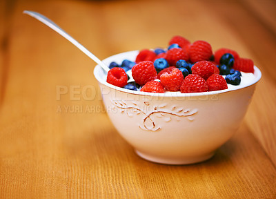 Buy stock photo Wood, berries and bowl with yogurt, raspberry and blueberry for organic snack. Food, cuisine and breakfast for health, wellness and diet for morning nutrition and antioxidant wellbeing in studio