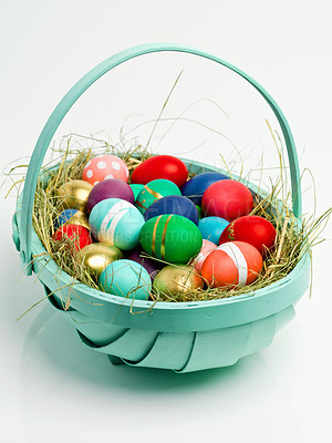 Buy stock photo Easter, basket and eggs for chocolate holiday with dessert snacks for traditional present, festive season or white background. Decoration, mockup space and studio with shell pattern, nest or giving