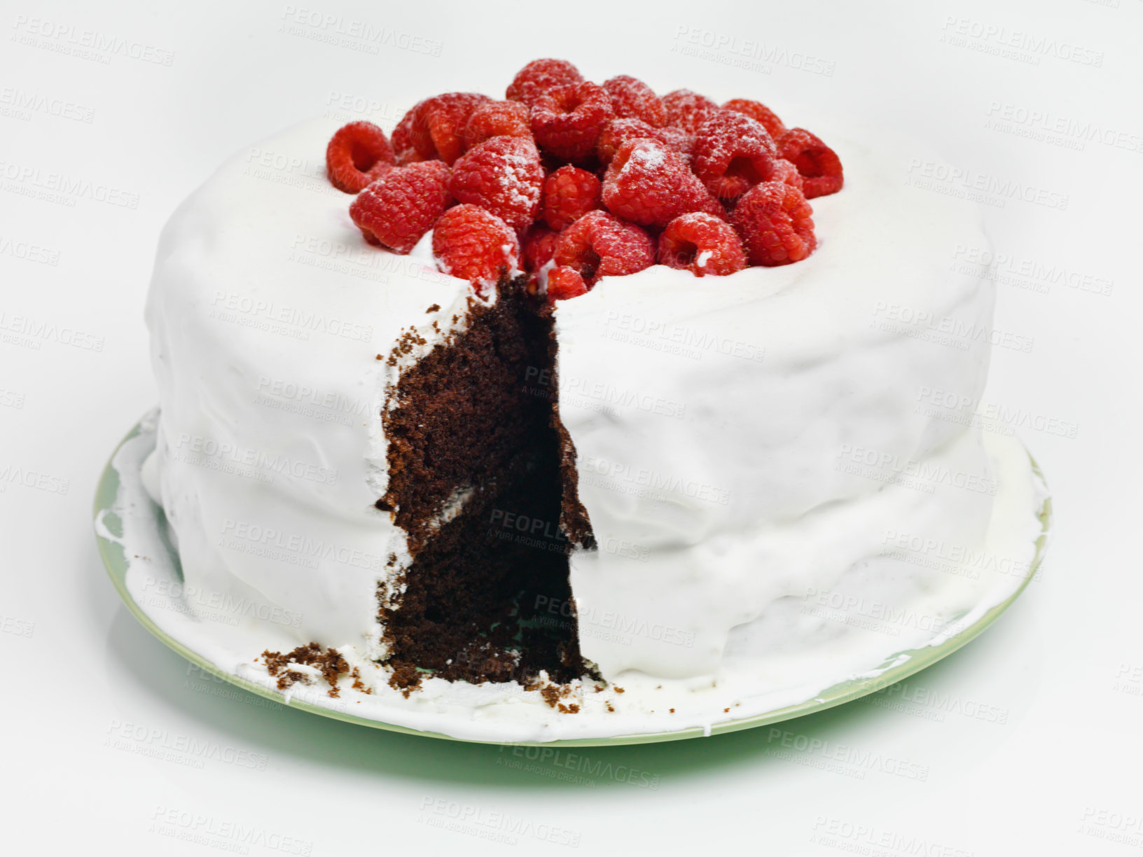 Buy stock photo Chocolate, dessert and blackforest cake for bakery, slice and raspberries for sweet snack. Fruit, icing and plate for display on table in pastry restaurant, creamy and baked confection with berries
