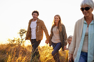 Buy stock photo Morning, walking and nature with family, sunshine and countryside with field and fresh air. Group, mother and father with granny and child with hiking and summer with vacation, happy and getaway trip