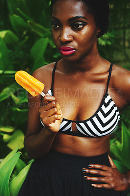 Buy stock photo Black woman, fashion and style with popsicle in garden with confidence for glamour, bra and summer outfit. Female person, clothes and trendy look in outdoor on hot weather for edgy and modern.