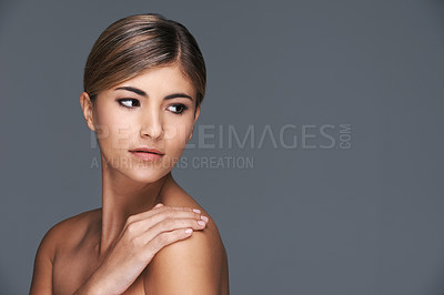 Buy stock photo Skincare, space and thinking with natural woman in studio isolated on grey background for wellness. Aesthetic, beauty and vision with confident young model on mockup for dermatology treatment