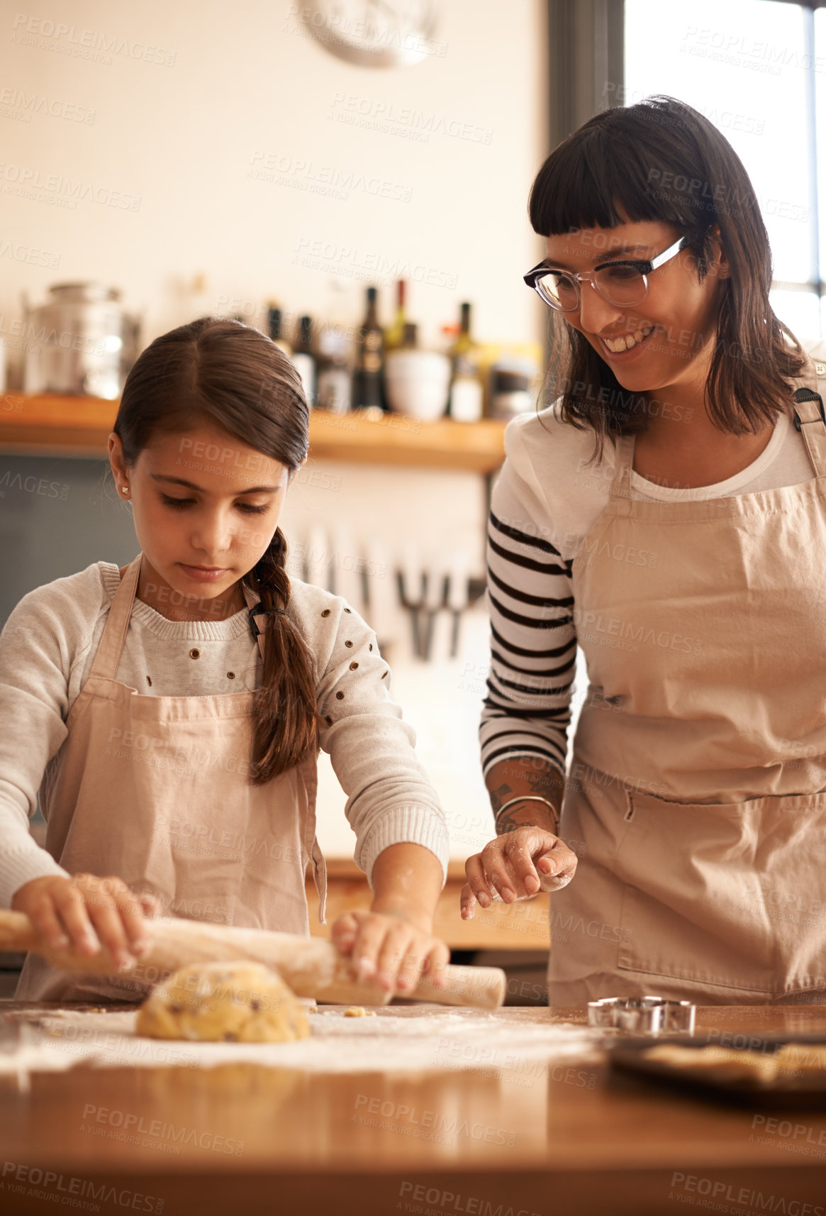 Buy stock photo Mother, kid and happy with dough to bake biscuits in kitchen for easter season or bonding, child development and growth. Home, family and flower for cookies with fun, teaching and support for hobby