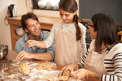 Buy stock photo Mother, father and girl with baking in kitchen with dough, happiness and teaching with support or pride. Family, parents and child with helping, learning and bonding with cooking for dinner and hobby