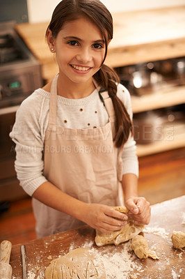 Buy stock photo Girl, dough and baking portrait in kitchen, pastry and prepare flour mixture for cooking. Female person, kid and smile for learning in home, child development and education for cookie skill or cake