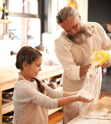 Buy stock photo Girl, kid or grandfather with flour in kitchen for cooking, baking or teaching with support or helping. Family, senior man or grandchild with dough or cake preparation in home for bonding or learning