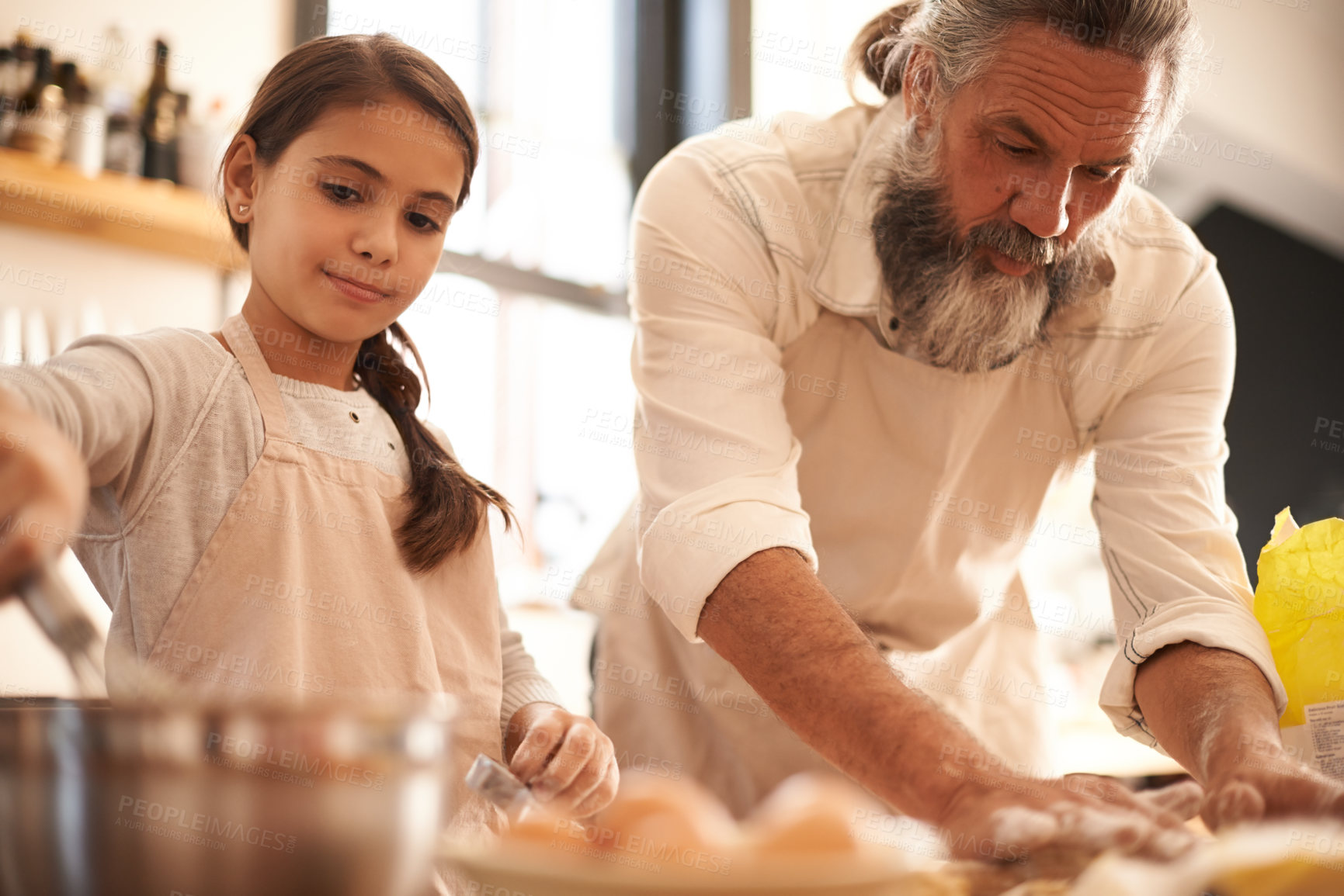 Buy stock photo Girl, child and grandfather with baking in kitchen for cooking, cookies and teaching with support or helping. Family, senior man and grandchild with dough preparation in home for bonding and learning