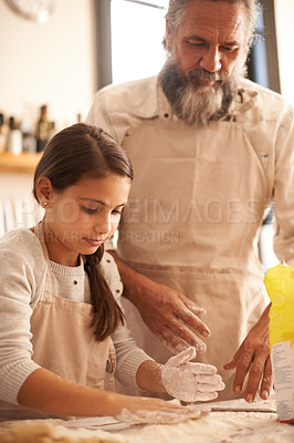 Buy stock photo Girl, child and grandpa with dough in kitchen for cooking, baking and teaching with support and helping. Family, senior man and grandchild with flour for preparation in home with bonding and learning