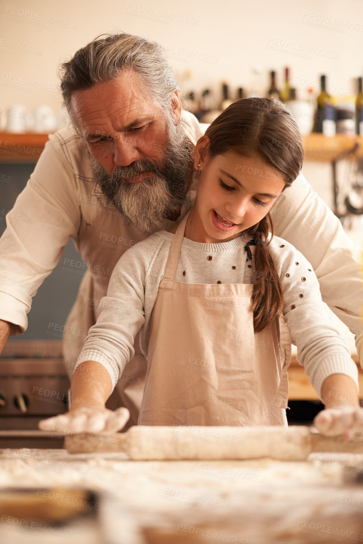 Buy stock photo Girl, child and grandfather for cooking with dough for baking and teaching with support, helping or rolling pin. Family, senior man or grandchild with cake preparation in home for bonding or learning