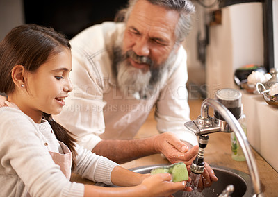 Buy stock photo Grandfather, child and washing hands with water to clean in kitchen, skincare and safety. Mature man, grandchild and liquid for protection against bacteria, learn and hygiene to prepare for cooking