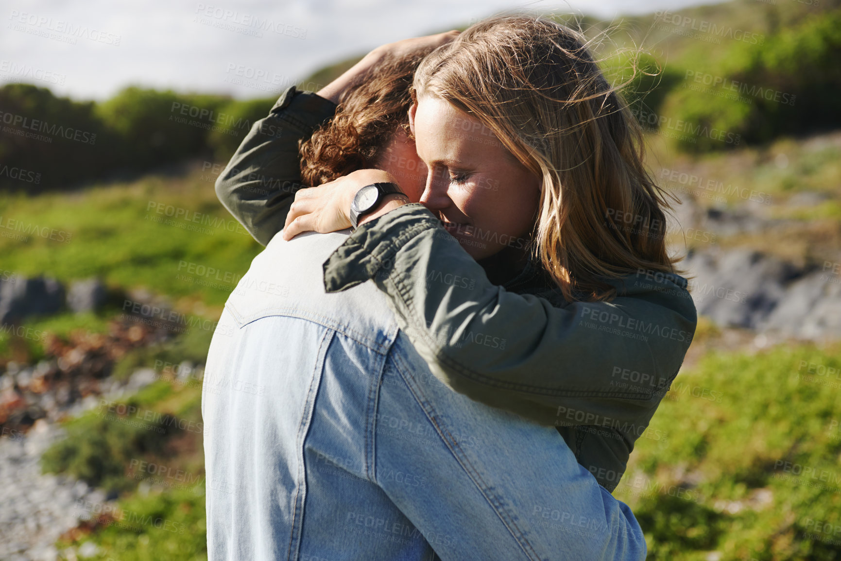 Buy stock photo Hug, nature and couple with love, smile and happiness with weekend break and holiday for honeymoon. Outdoor, romance and embrace with woman and man with sunshine and summer with vacation or adventure